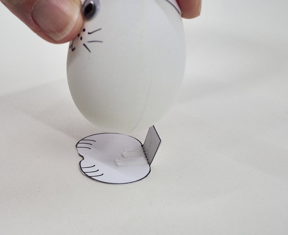 Easter Bunny Egg craft activity for kids. Free printable template and fully illustrated tutorial.