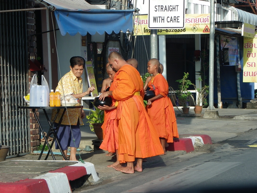 Phuket, Thailand, Monks collecting Alms