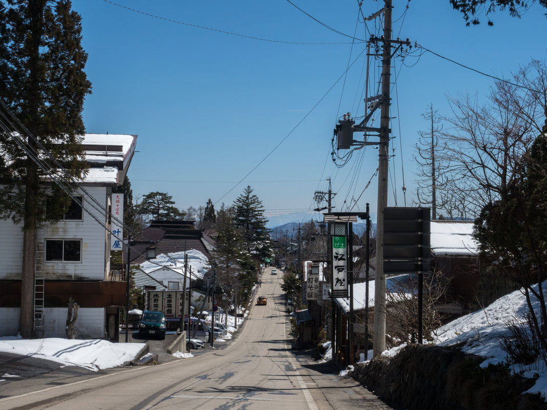Main street along the walking track. The walking track from the Lower Togakushi Shrine to the Middle Togakushi Shrine. The Middle Shrine is at the top of the street.