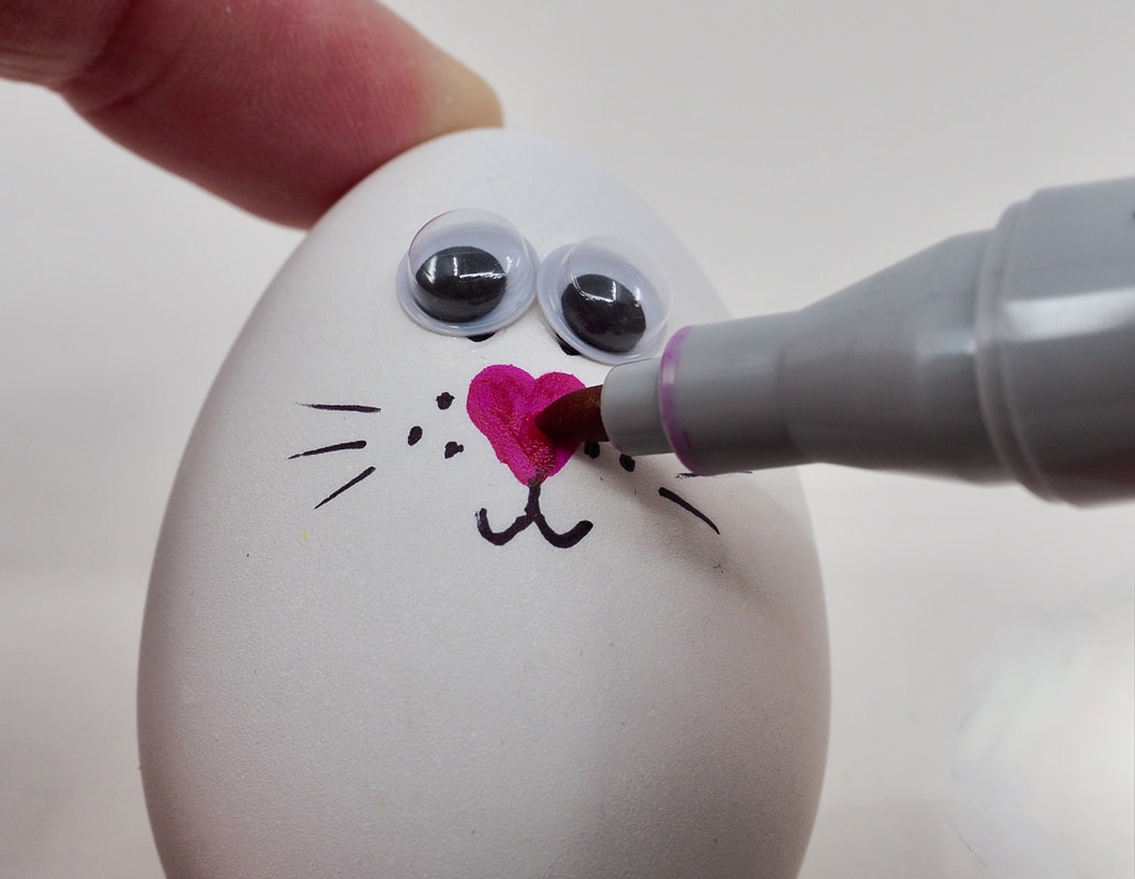 Easter Bunny Egg craft activity for kids. Free printable template and fully illustrated tutorial.