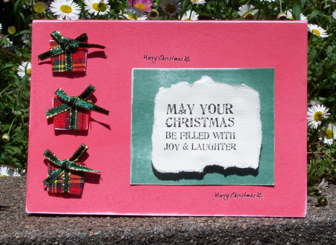 Make Christmas cards using rub on embellishments