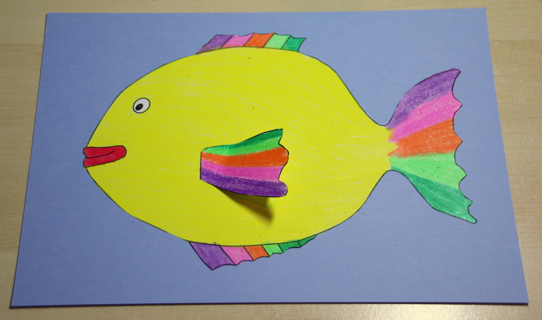 Rainbow Fish colouring Craft for kids with free printable template. 