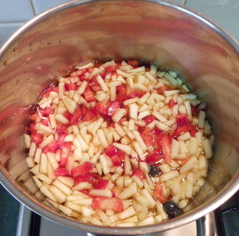 cooking berry and apple jam