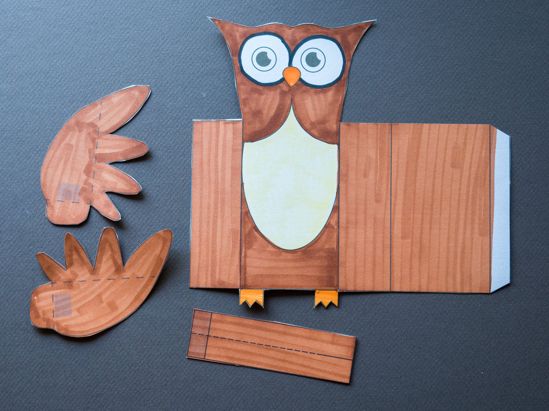 Owl puppet kids craft with free printable download. The owls wings will move. 