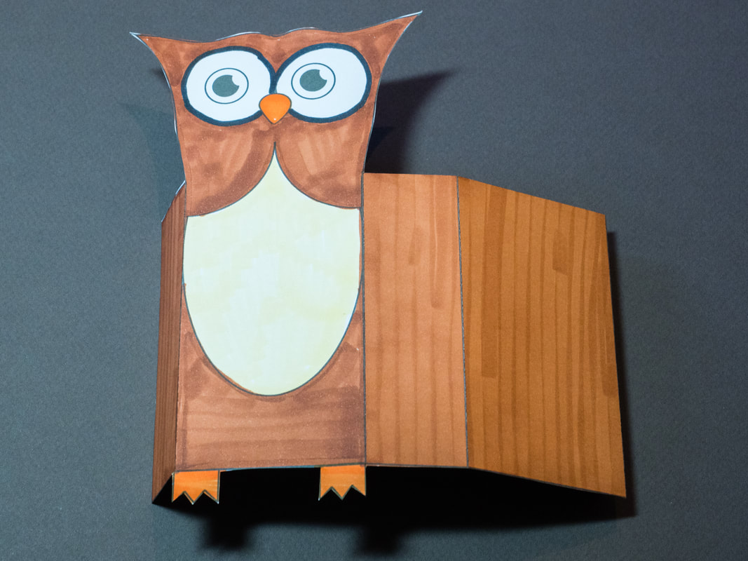 Owl puppet kids craft with free printable download. The owls wings will move. 