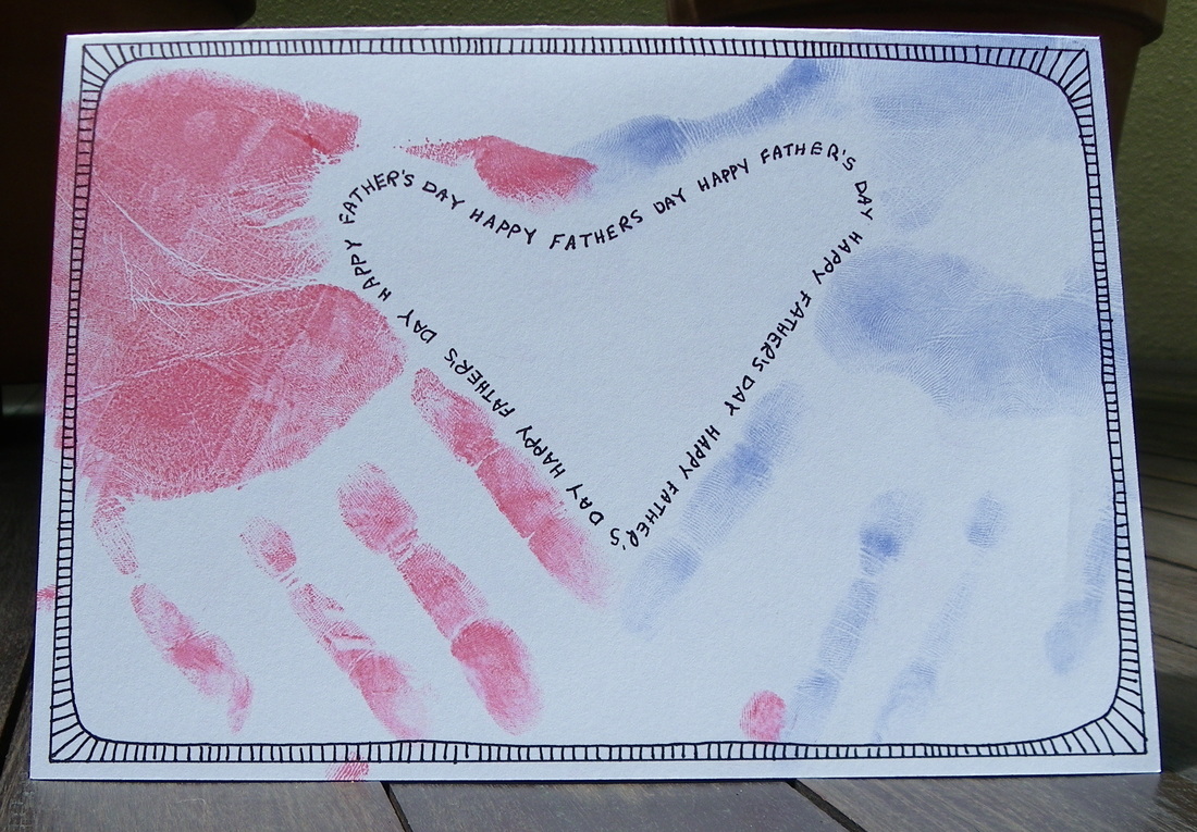 Free craft instructions how to make a father's day care with hand prints forming a love heart
