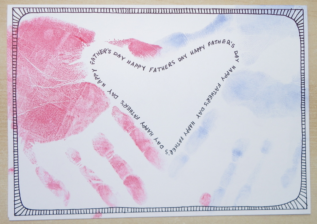Free craft instructions how to make a father's day care with hand prints forming a love heart