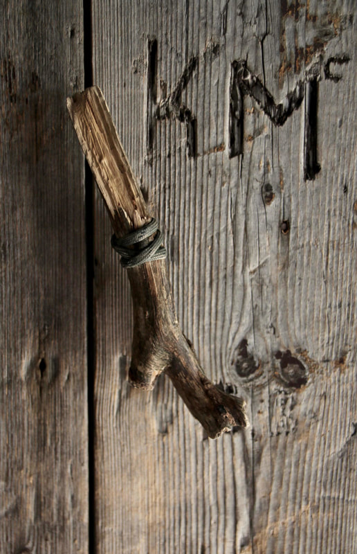 Falls Creek, Victoria, Australia. Wallace Hut. Stick of wood for the door handle. 