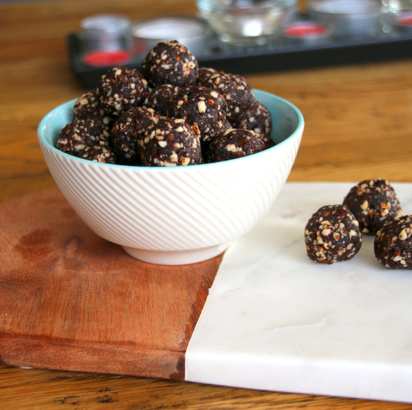 Easy recipe for Chocolate, Almond and Date Balls. Printable version of the recipe available.