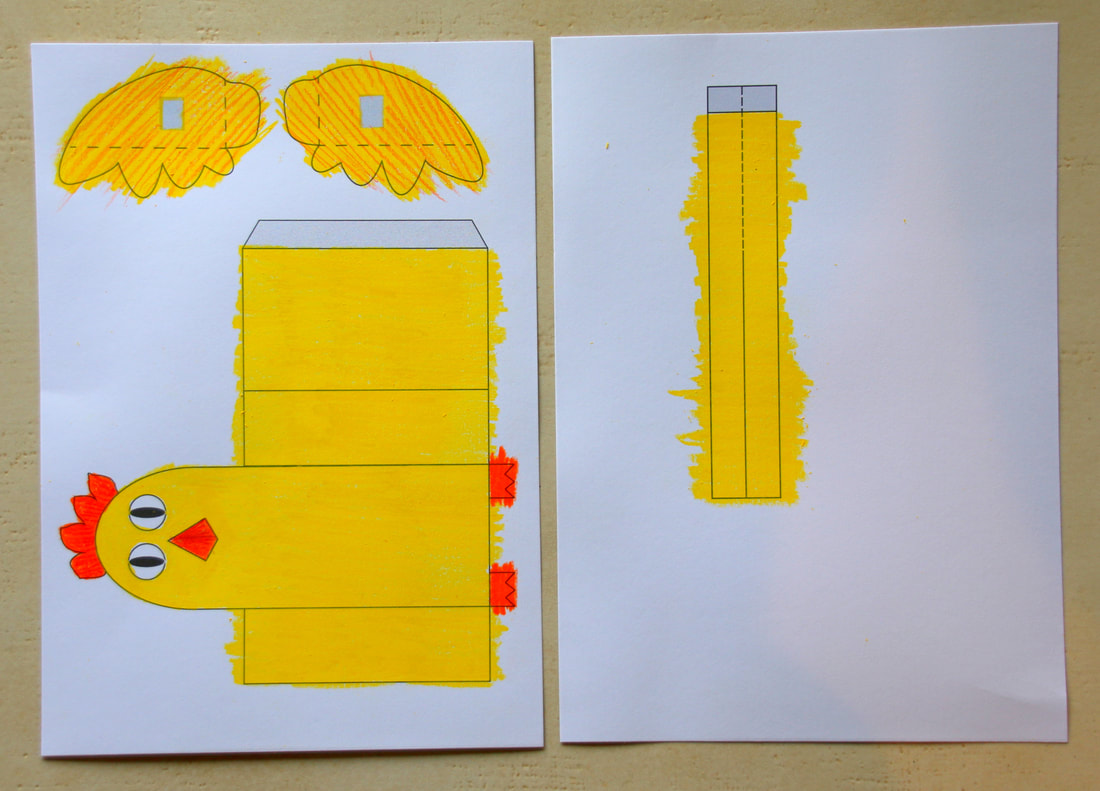 Chicken craft for kids with lever controlled moving wings. Free printable template and instructions. 