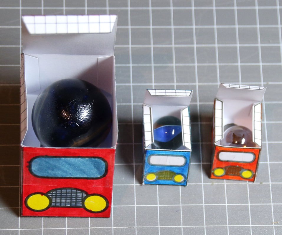 Marble powered car craft for kids. Cool cars powered by marbles with free printable template and instructions.