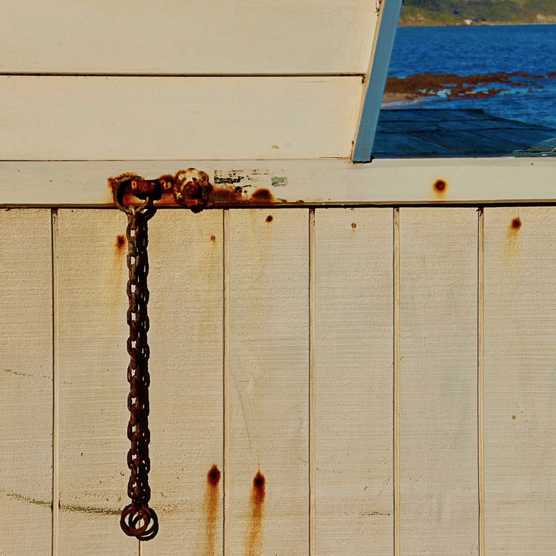 Rusting Chain on a beach hut. Mount Eliza, Australia