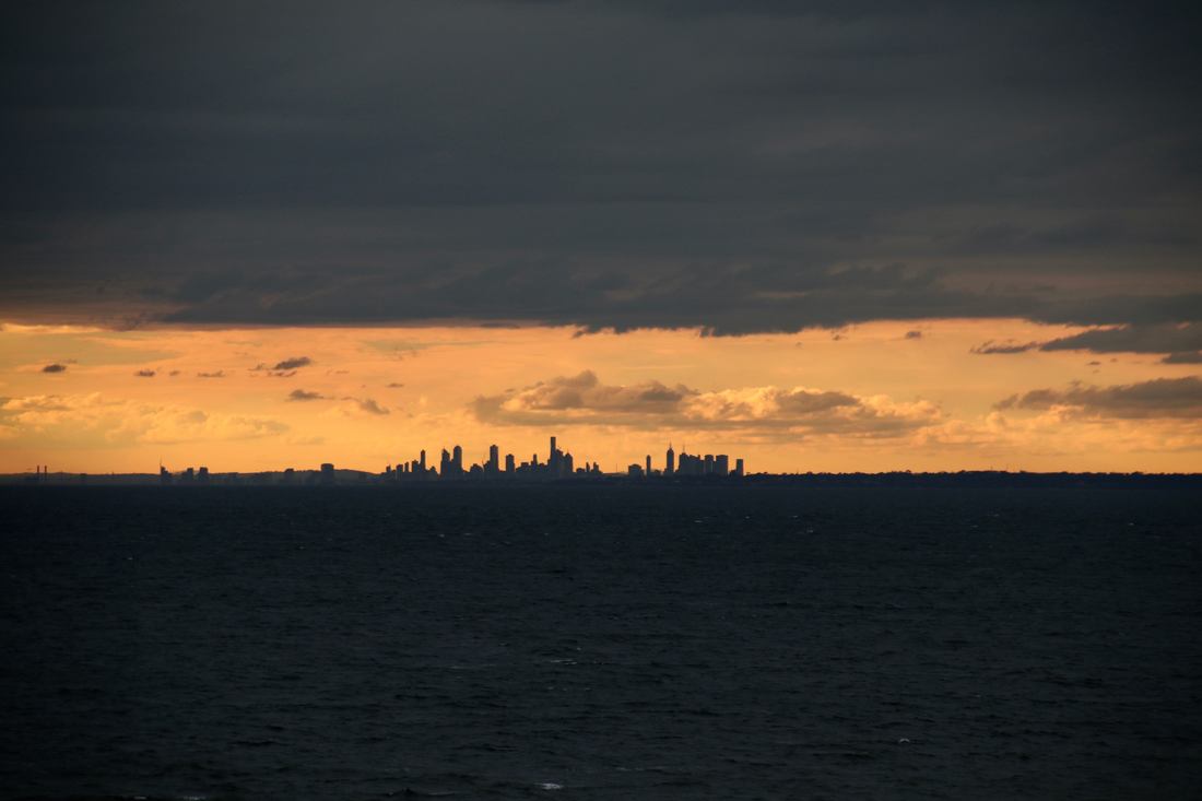 Sunset over Port Phillip Bay highlighting Melbourne City. Taken from Mount Eliza.